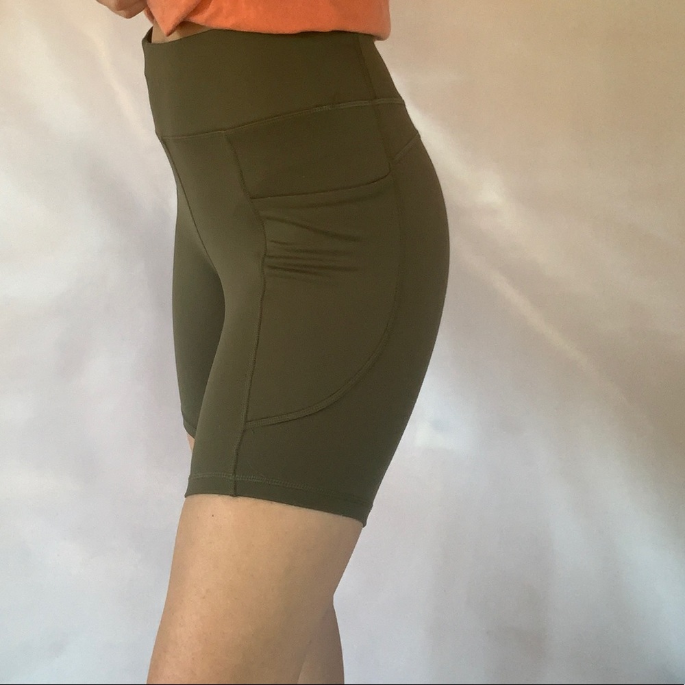 Army green biker shorts with pockets
